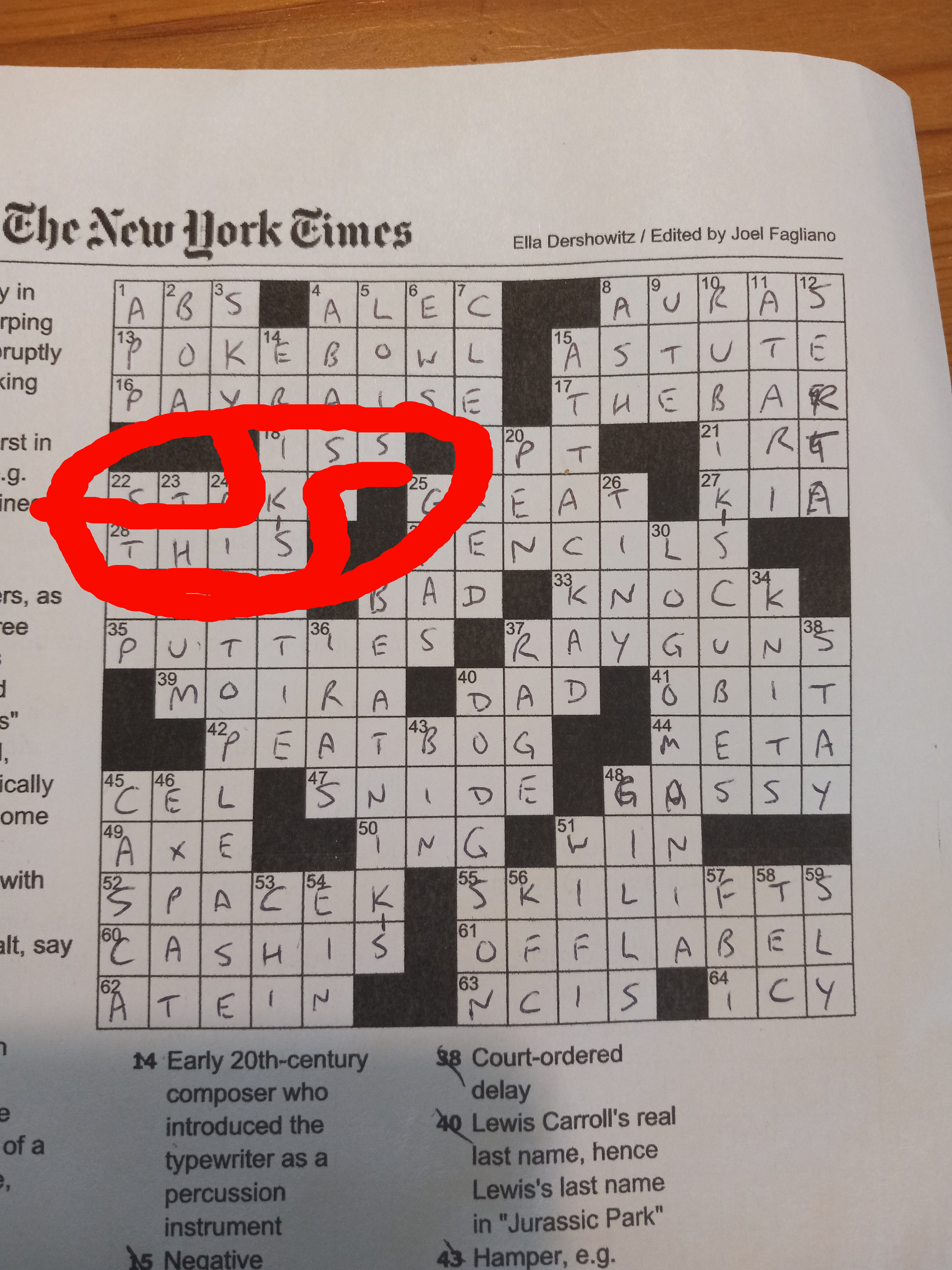 Crossword puzzle with the answer THIS KISS circled